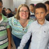 Judah 1 outreach visit with team member and local children